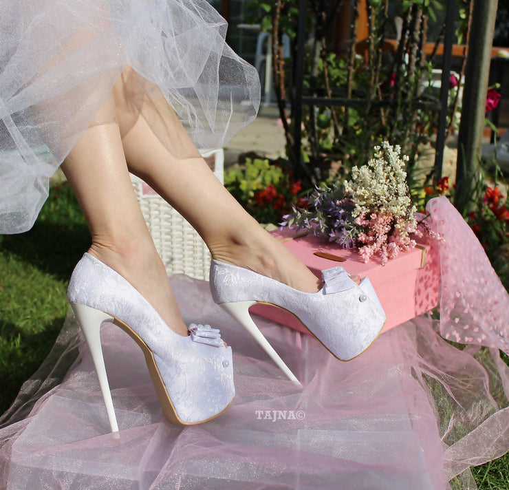 Ivory leather platform bridal shoes with pearl flowers